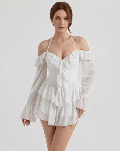 Serena Mini Dress by Lauven – White Ruffle Halter Mini Dress with Sheer Sleeves for a feminine look.