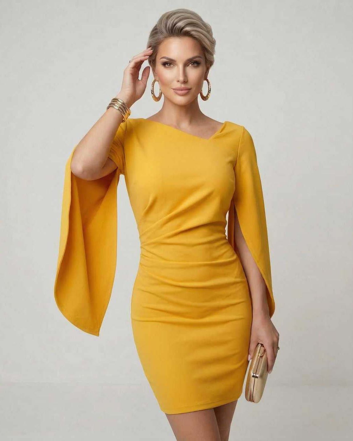 Serena Mini Dress in vibrant yellow with cloak sleeves by Lauven, perfect for parties and sophisticated occasions.