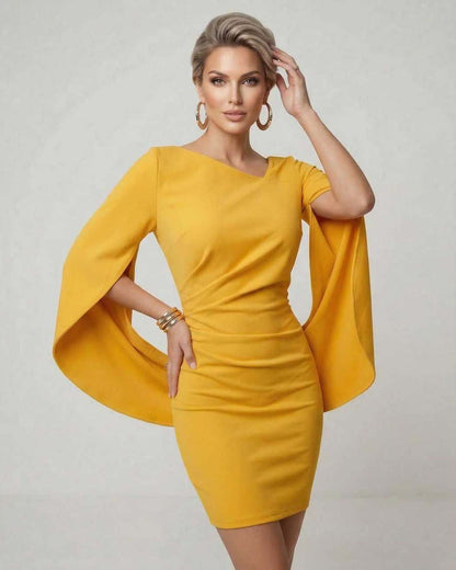 Serena Mini Dress by Lauven in vibrant yellow with sleek cloak sleeves and a flattering sheath silhouette.