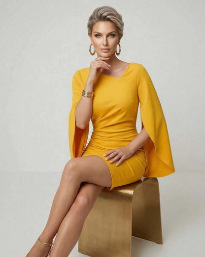 Serena Mini Dress by Lauven in vibrant yellow with cloak sleeves, featuring an elegant O-neckline and sheath silhouette.