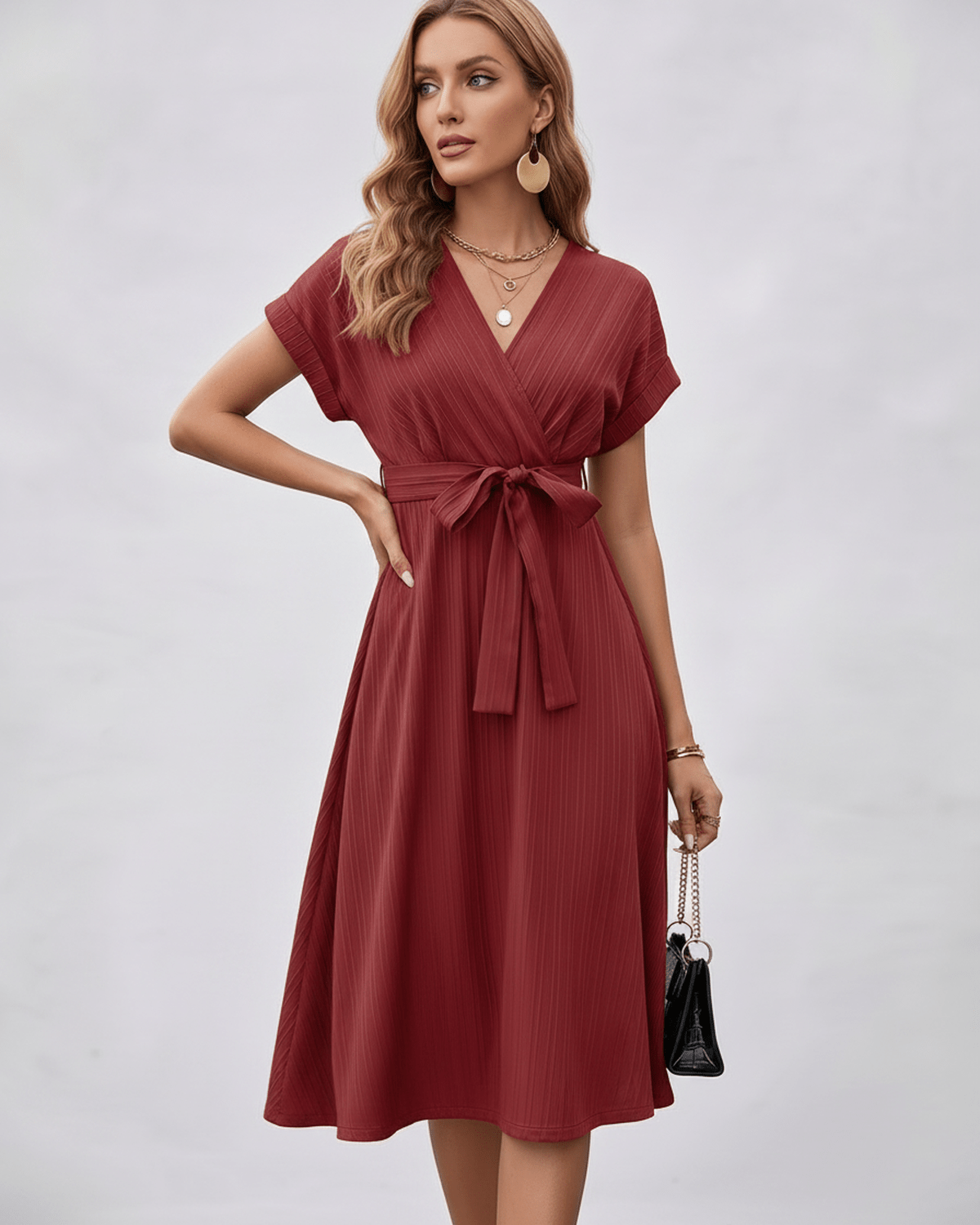 Serene Midi Dress in a deep red color, featuring lightweight pleated fabric, V-neck design, and self-tie belt by Lauven.