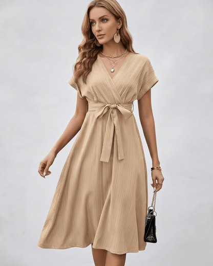 Serene Midi Dress by Lauven in pleated fabric, V-neck, A-line silhouette with self-tie belt for adjustable shaping.