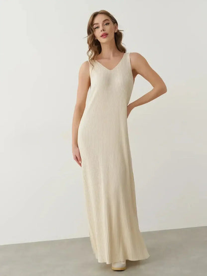 Serene Rib Maxi Dress in soft knit, featuring a V-neckline and a flowing silhouette, perfect for summer wear.