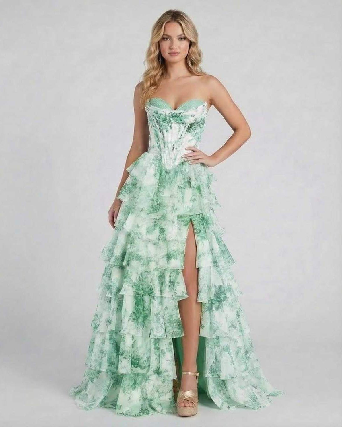 Serenella Maxi Dress by Lauven, strapless floral tiered chiffon dress in green, showcasing elegant ruffles and a high slit.
