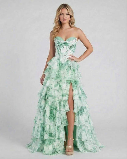 Serenella Maxi Dress by Lauven, strapless floral tiered chiffon dress in green, showcasing elegant ruffles and a high slit.