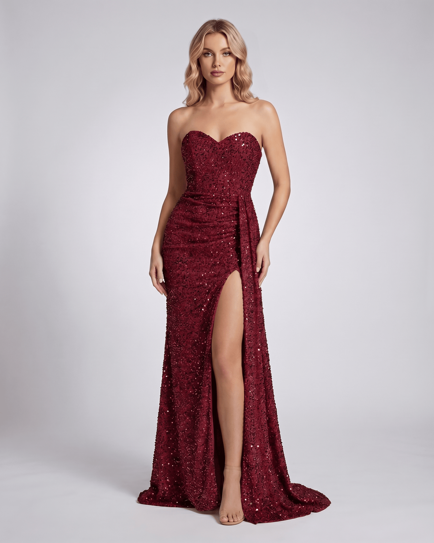 Serenza Maxi Dress in burgundy, strapless, fully embellished, bodycon silhouette, featuring a seductive thigh-high slit.