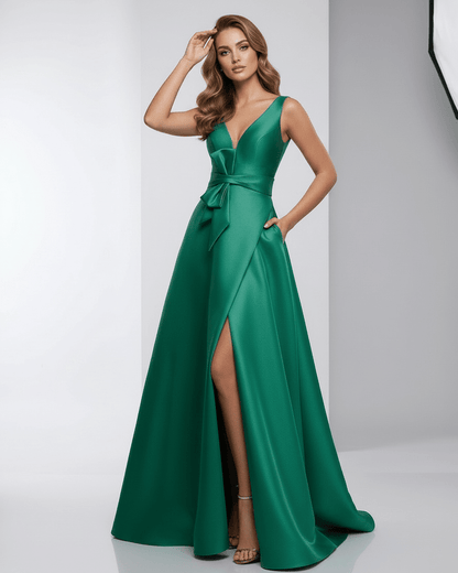Siena Maxi Dress in green satin, A-line silhouette, V-neck, and knot bow detail by Lauven