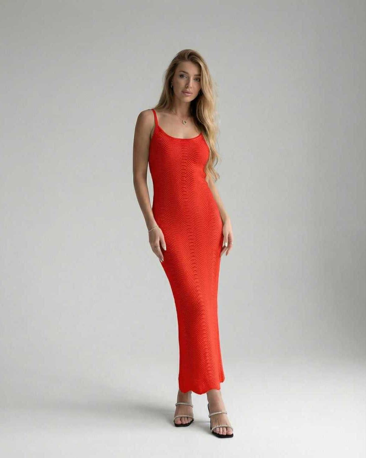 Siena Midi Dress showcasing a red bodycon design with a sleek sleeveless silhouette, featuring a textured finish by Lauven.