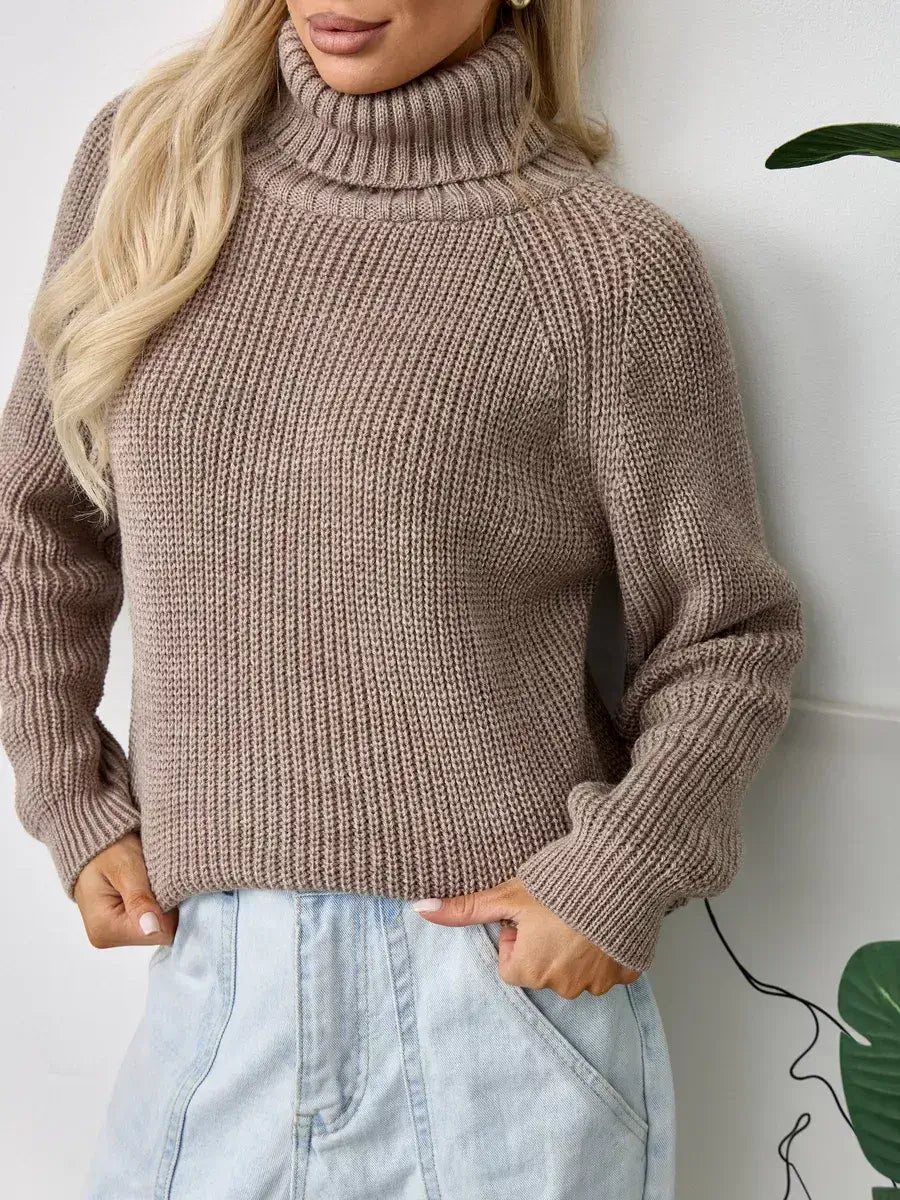 Siena Sweater by Lauven - Oversized beige knit turtleneck for women, combining warmth and luxury in a versatile design.