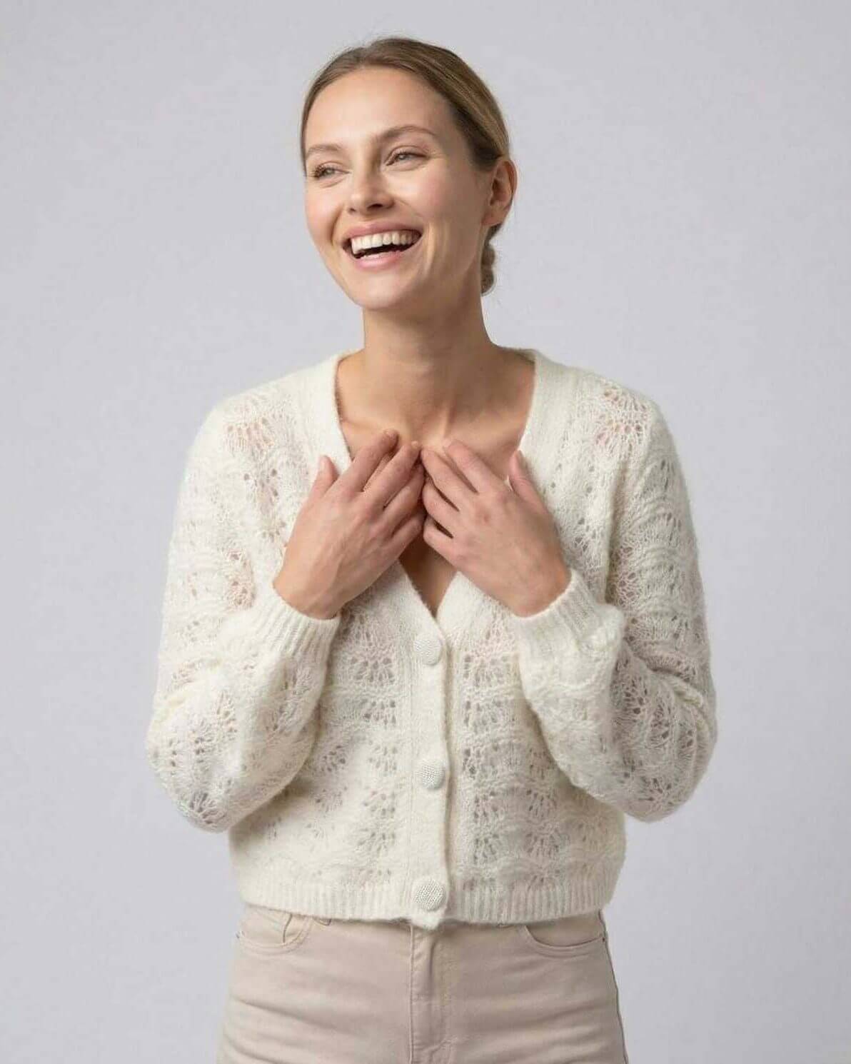 Sienna Cardigan by Lauven – Elegant women’s V-neck cardigan with hollow out knit and long sleeves.