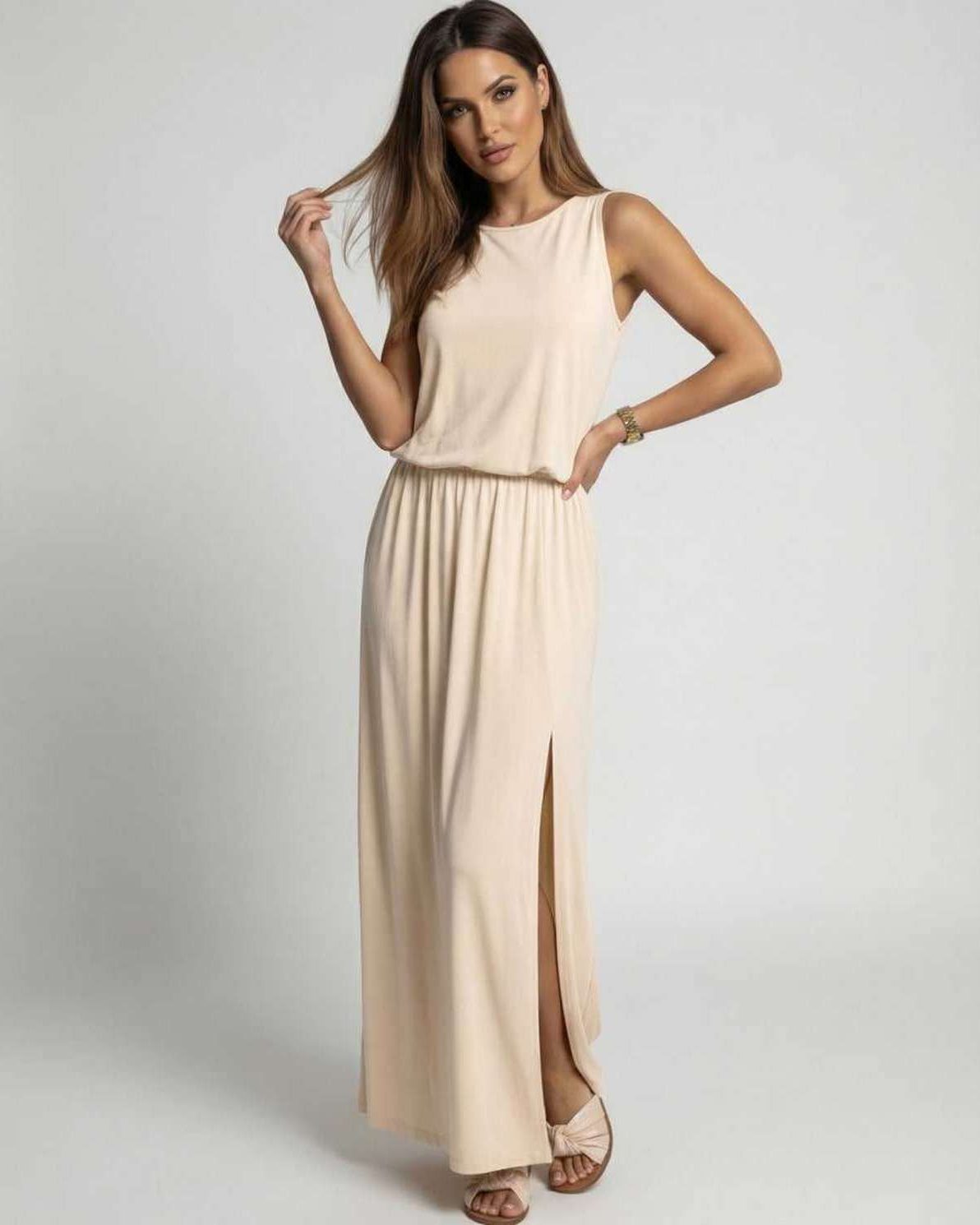 Sienna Maxi Dress: Beige sleeveless dress with side slit, relaxed fit, soft-touch by Lauven.
