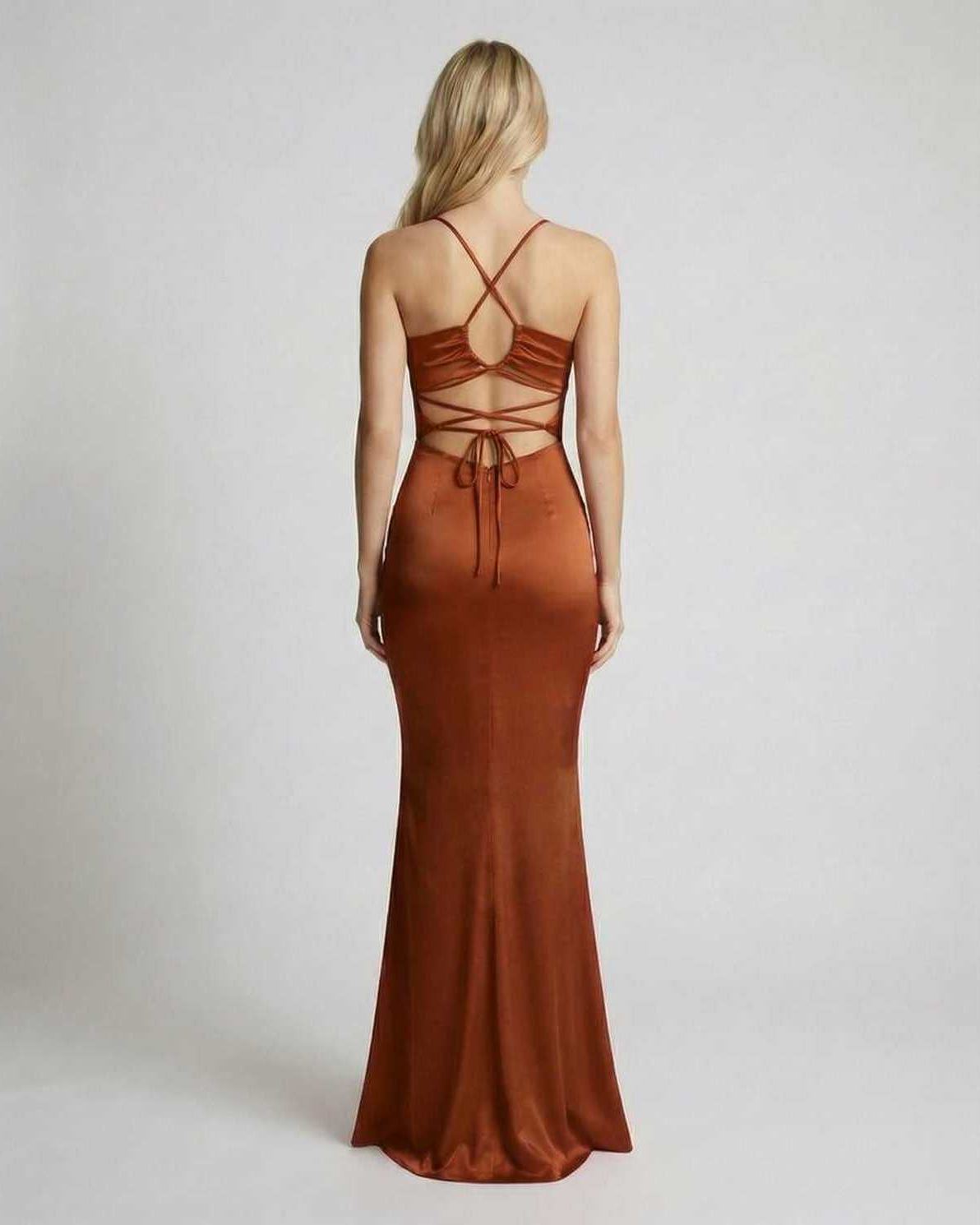 Back view of the Sienna Maxi Dress by Lauven, featuring sleek satin fabric, spaghetti straps, and a fluid silhouette.