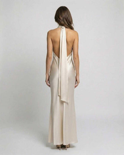 Sienna Maxi Dress back view, champagne satin finish, elegant halter neck design by Lauven.