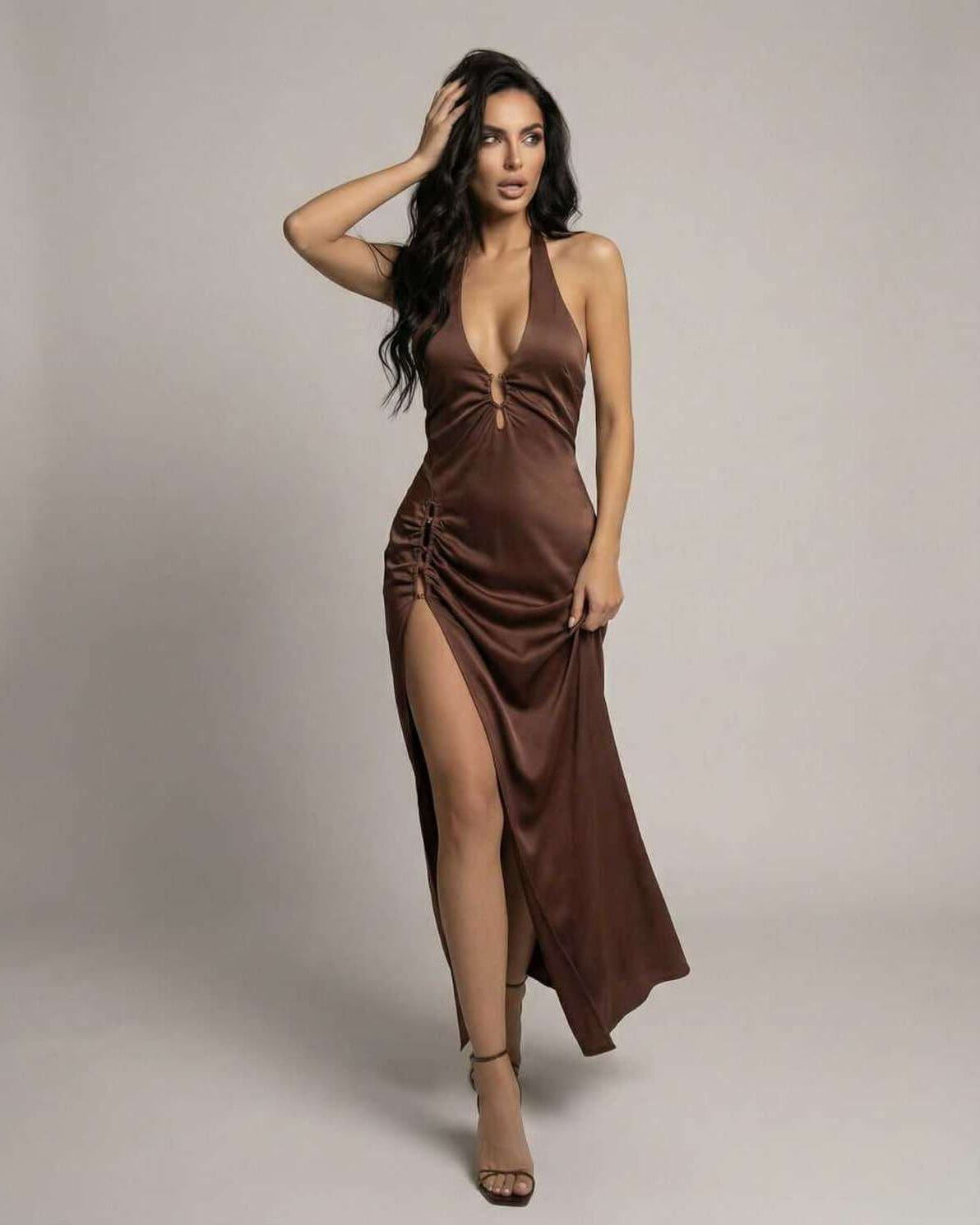 Sienna Maxi Dress by Lauven, showcasing a sleek satin design with a side slit and a stunning brown hue.