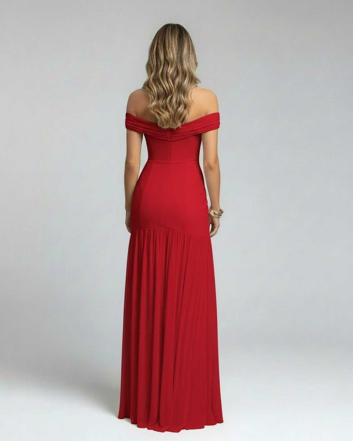 Back view of Sienna Maxi Dress by Lauven, featuring off-shoulder design and flowing red fabric.