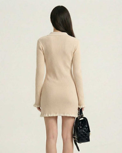 Sienna Mini Dress by Lauven featuring a stylish back view, showcasing its long sleeves and ribbed texture.