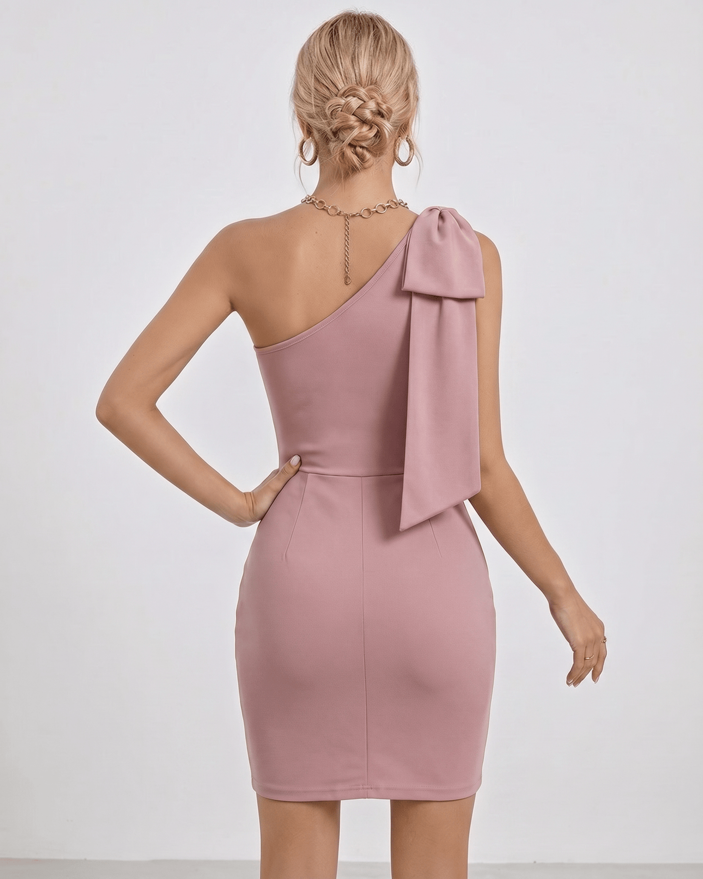 Sienna Mini Dress by Lauven, one shoulder design in soft blush pink, showcasing bodycon silhouette and elegant style.