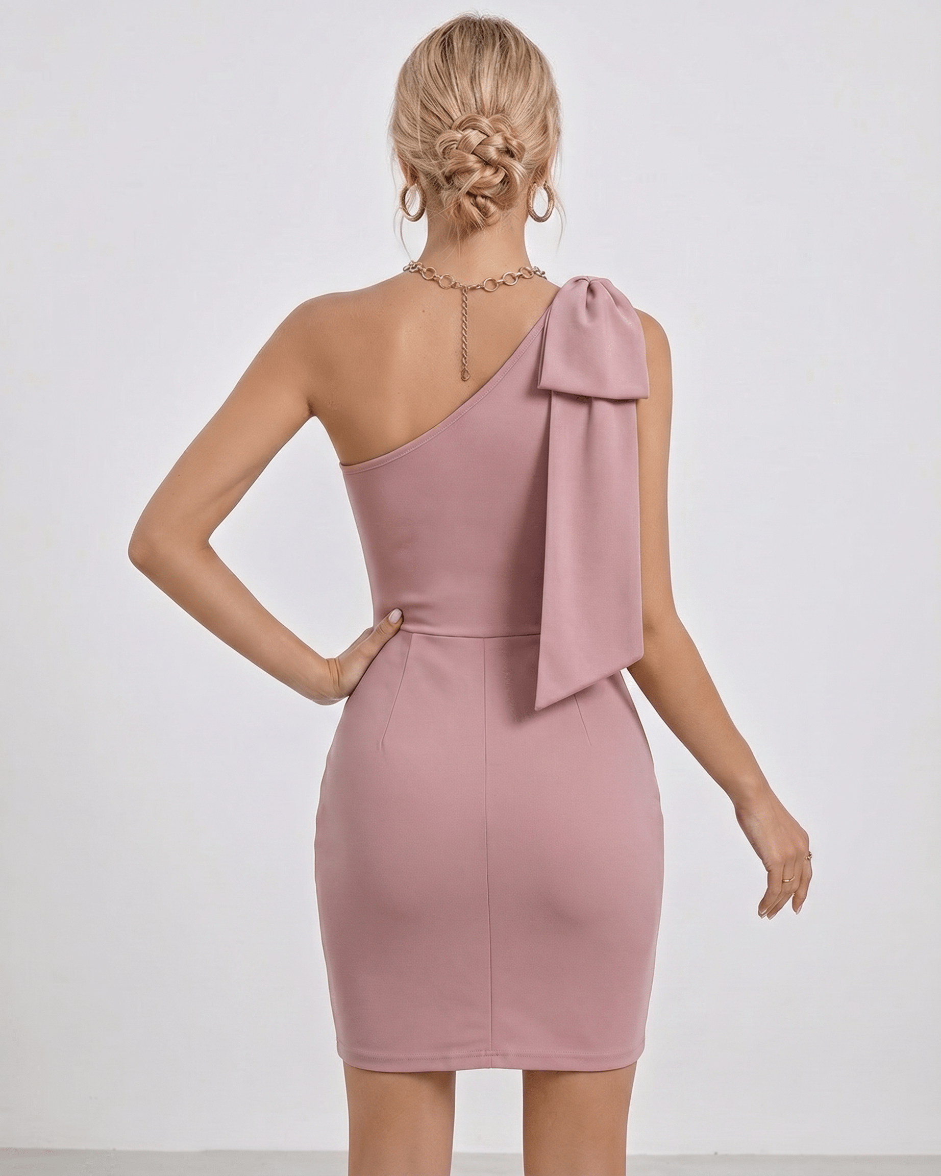 Sienna Mini Dress by Lauven, one shoulder design in soft blush pink, showcasing bodycon silhouette and elegant style.