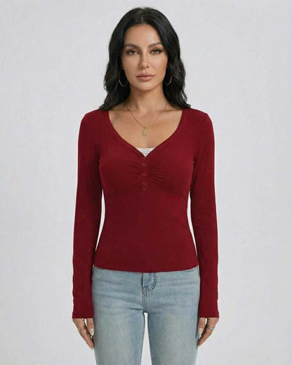 Women’s Sienna Pullover by Lauven, slim fit V-neck long sleeve top with button detail in red.