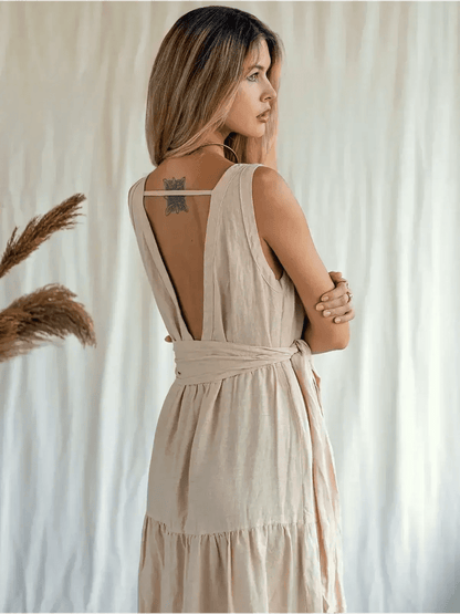 Sierra Maxi Dress featuring a stylish V-neckline and self-tie belt, showcasing its airy linen fabric and boho charm.