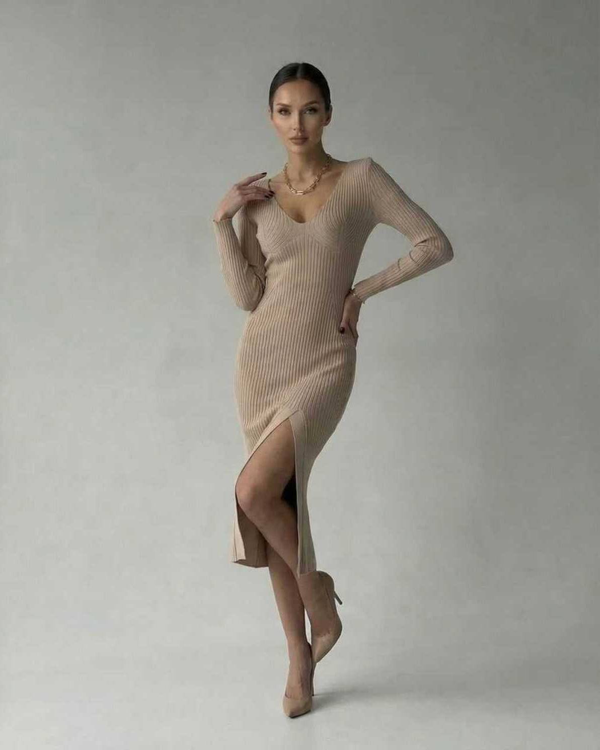 Sierra Midi Dress from Lauven - Sleek ribbed knit pencil dress with V-neck and side slit for a stylish look.