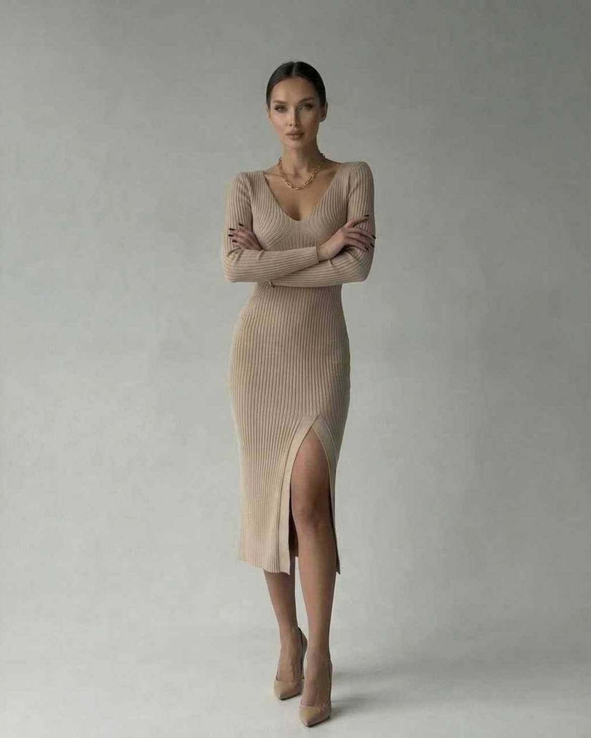 Sierra Midi Dress by Lauven, sleek ribbed knit pencil dress with V-neck and side slit.
