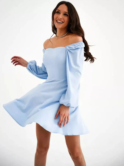Light blue mini dress with puffed sleeves and square neckline, perfect for summer events and wedding guest attire.