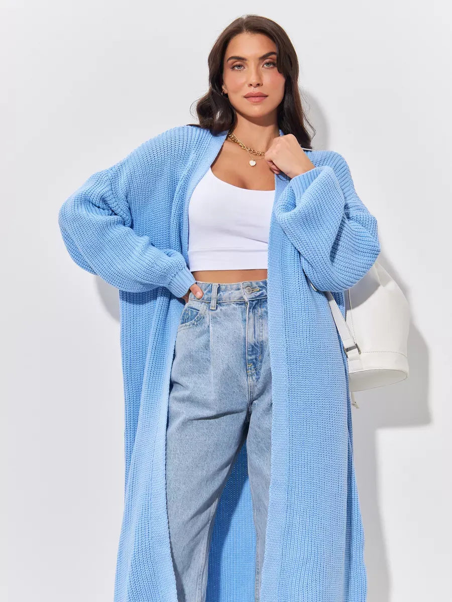Skylar Cardigan by Lauven - Long oversized knitwear coat in light blue worn over casual outfit.