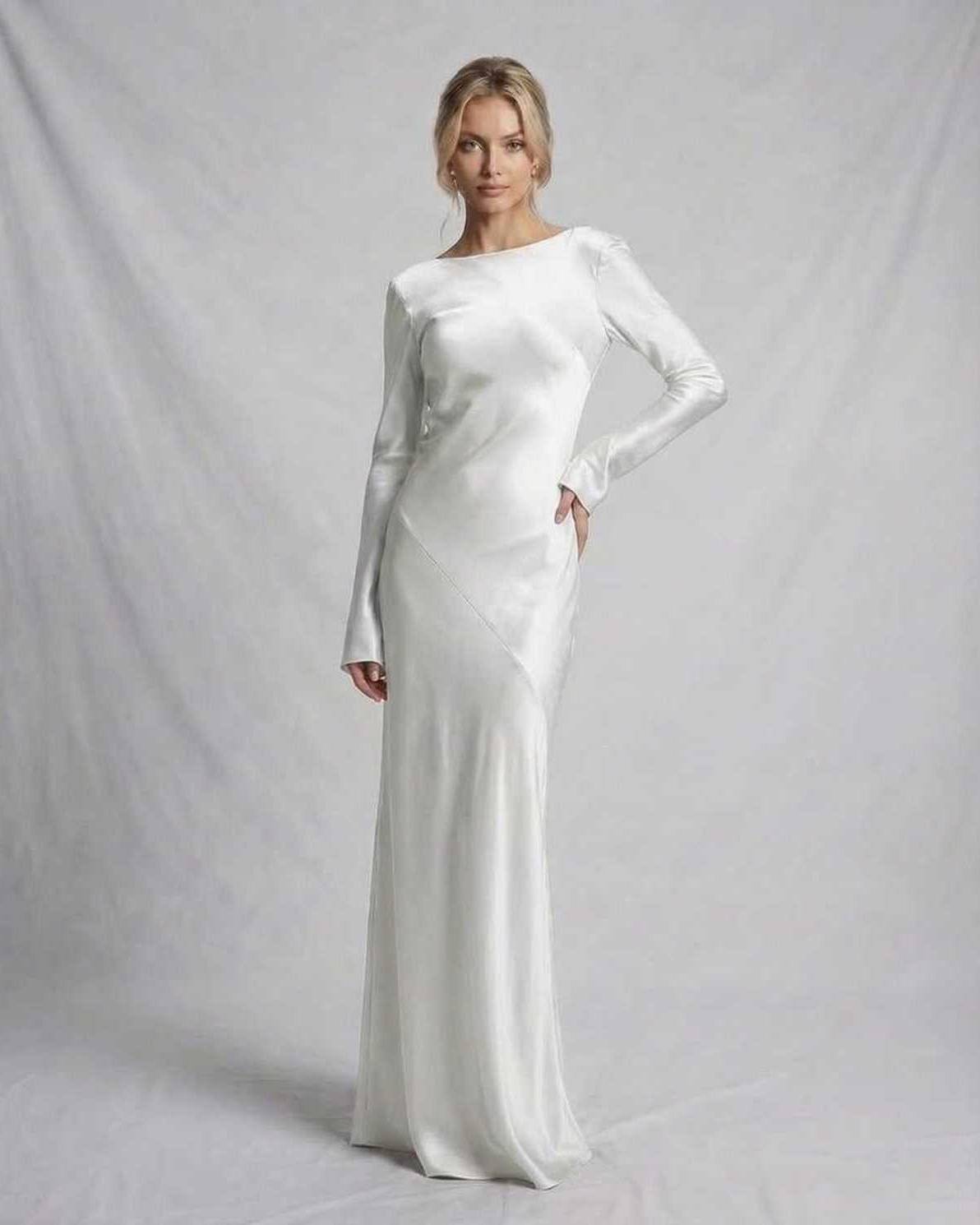 Solace Maxi Dress by Lauven, featuring a luxurious ivory satin fabric with a sculpted silhouette.