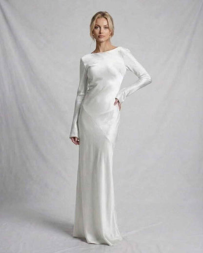 Solace Maxi Dress by Lauven, a luxurious ivory satin gown with a sleek silhouette and elegant design.