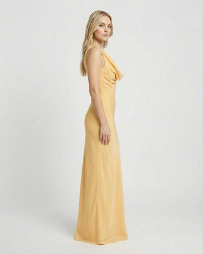 Solara Maxi Dress by Lauven, showcasing a satin-effect cowl neck design in a stunning yellow hue.