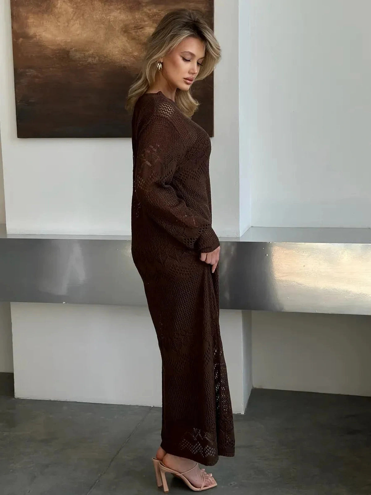 Solara Maxi Dress by Lauven featuring a warm dark brown crochet knit design ideal for elegant seasonal celebrations.