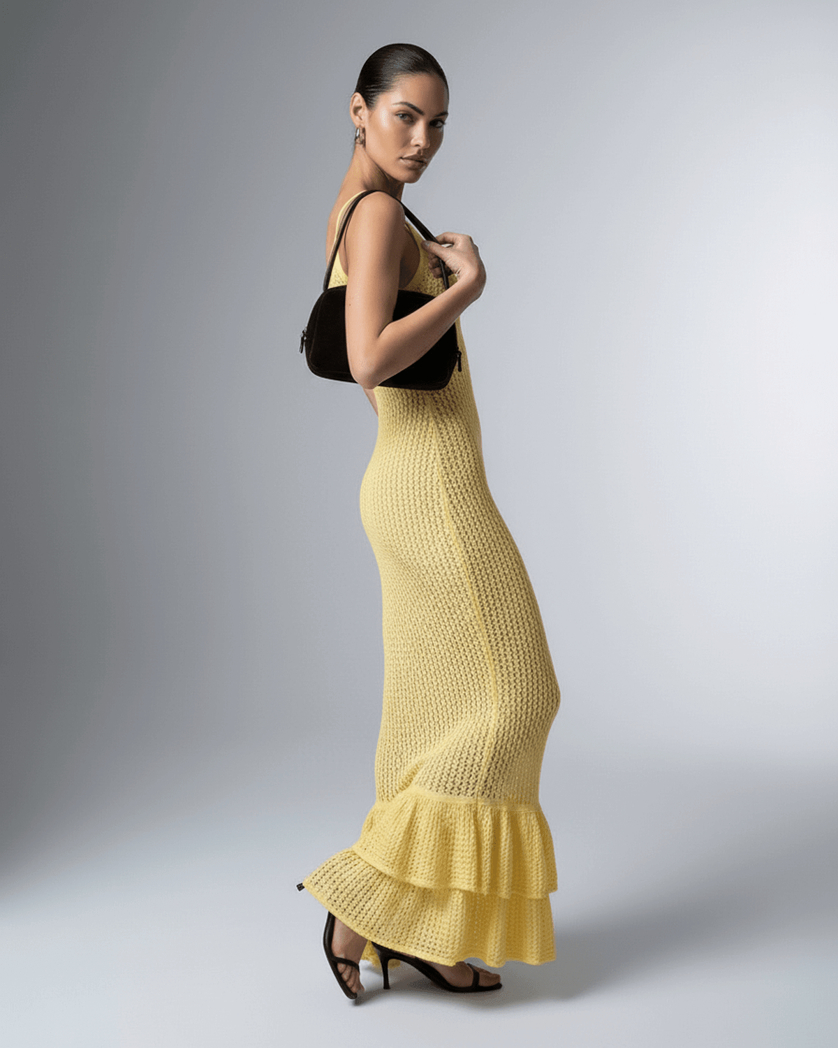 Solara Maxi Dress by Lauven – Elegant yellow bodycon maxi dress with hollow out detail, showcasing a sleek silhouette.