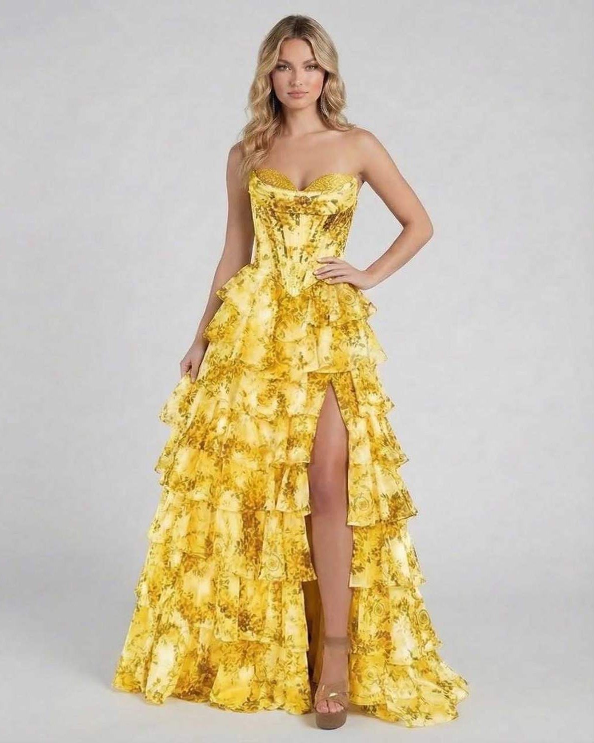 Solara Maxi Dress by Lauven in yellow floral tiered chiffon, featuring a sweetheart neckline and cascading layers.