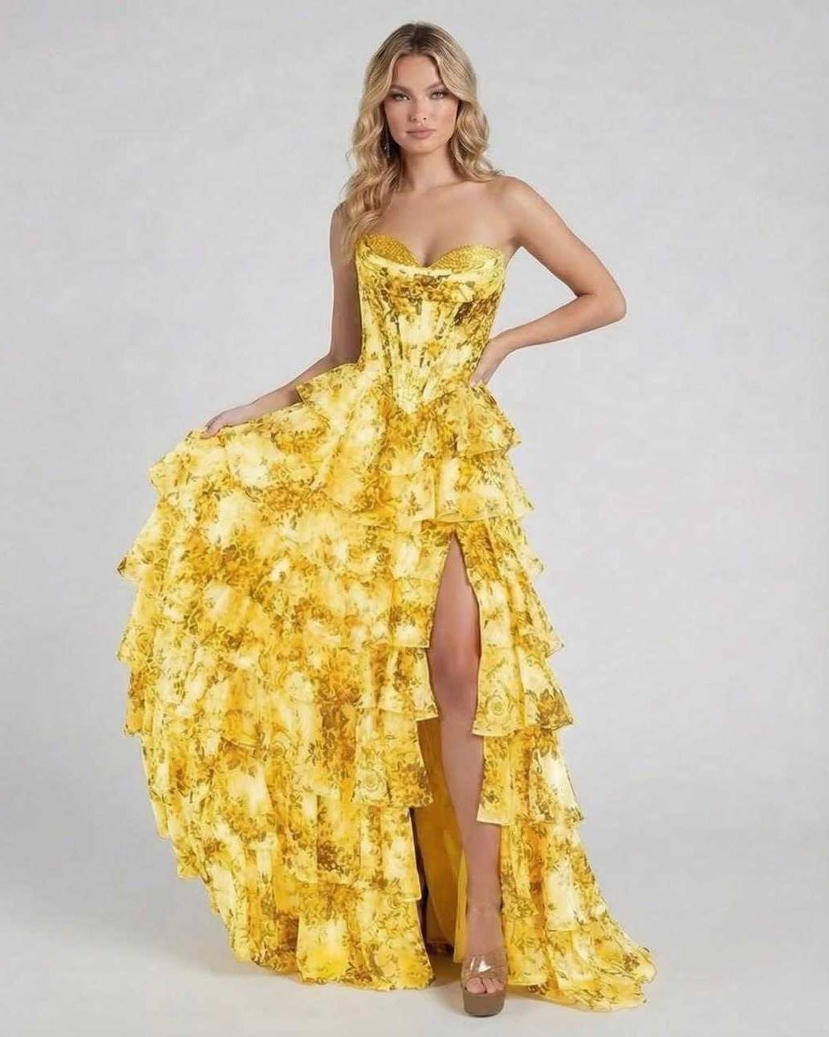 Solara Maxi Dress by Lauven in yellow floral chiffon with tiered design and sweetheart neckline.
