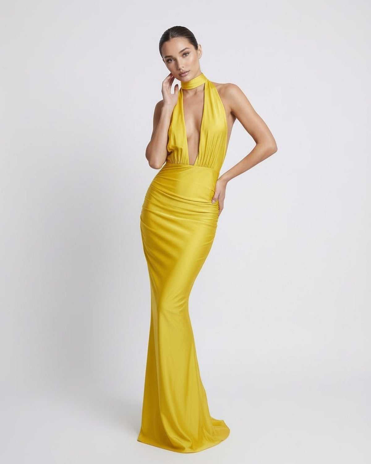 Solara Maxi Dress in vibrant yellow, featuring a deep plunge, high waist, and sleek fabric, by Lauven for stunning occasionwear.
