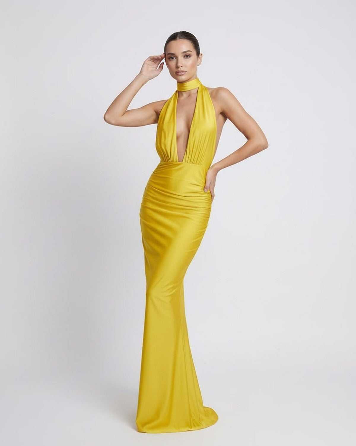 Solara Maxi Dress: Yellow halter maxi dress with deep plunge, high waist, designed by Lauven for modern occasionwear.