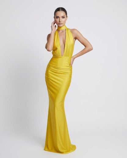 Solara Maxi Dress - Yellow halter design with deep plunge, high waist, and sleek fabric by Lauven.