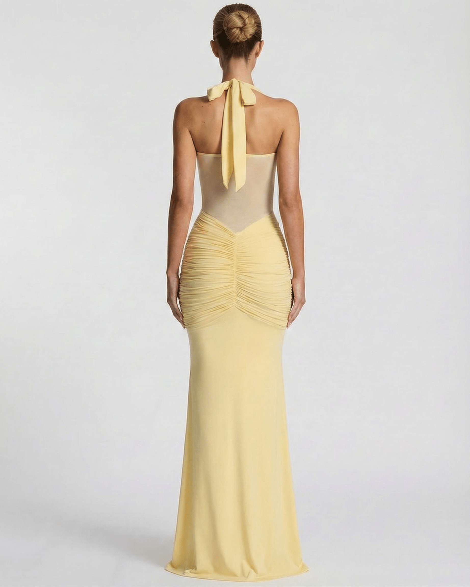 Solara Maxi Dress - elegant yellow halter dress with mesh panel and mermaid silhouette by Lauven.