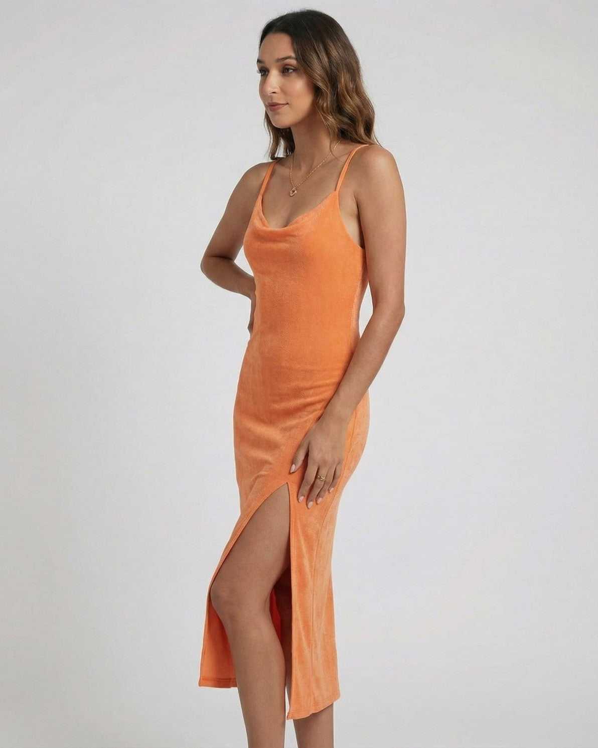 Solara Midi Dress by Lauven, featuring a cowl neck and elegant slit, perfect for elevated evenings.