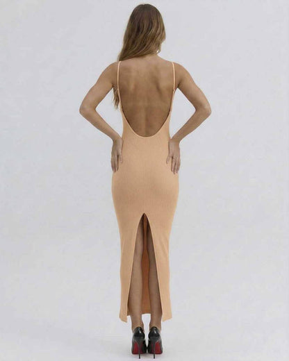Back view of Solara Midi Dress by Lauven, featuring a deep cut and stylish slit for an elegant look.