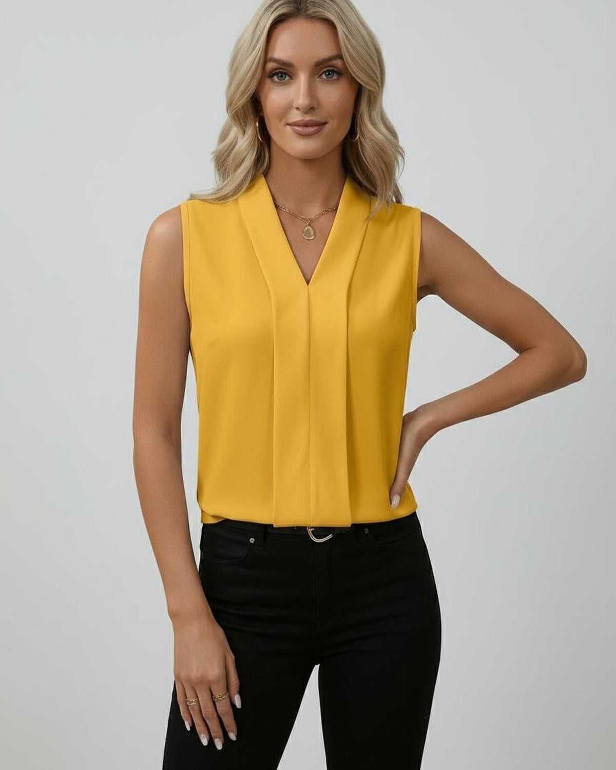 Solara Top by Lauven - Elegant sleeveless yellow top with V-neck design, perfect for day or evening wear.