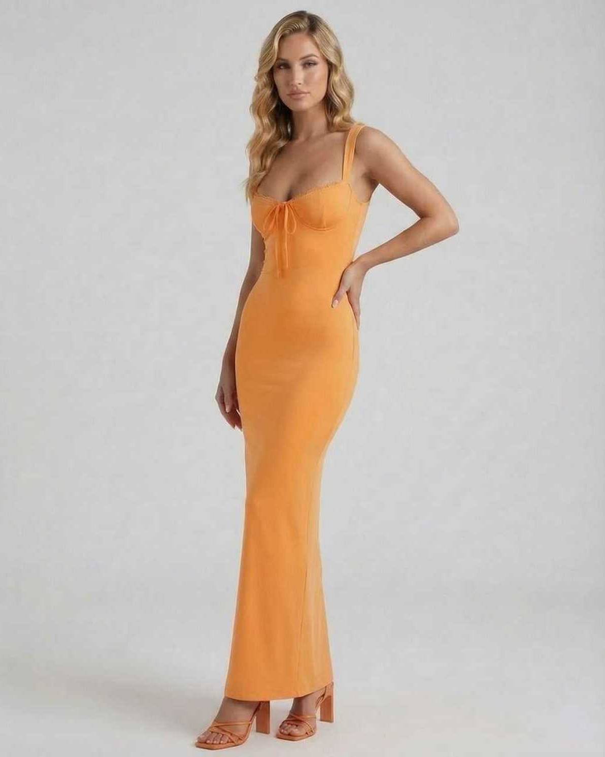 Soleil Maxi Dress in vibrant orange, featuring spaghetti straps and a sleek fit by Lauven.