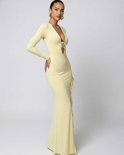 Soleil Maxi Dress showcasing a yellow deep V-neck style with ruffle high slit, featuring a refined tie detail by Lauven.