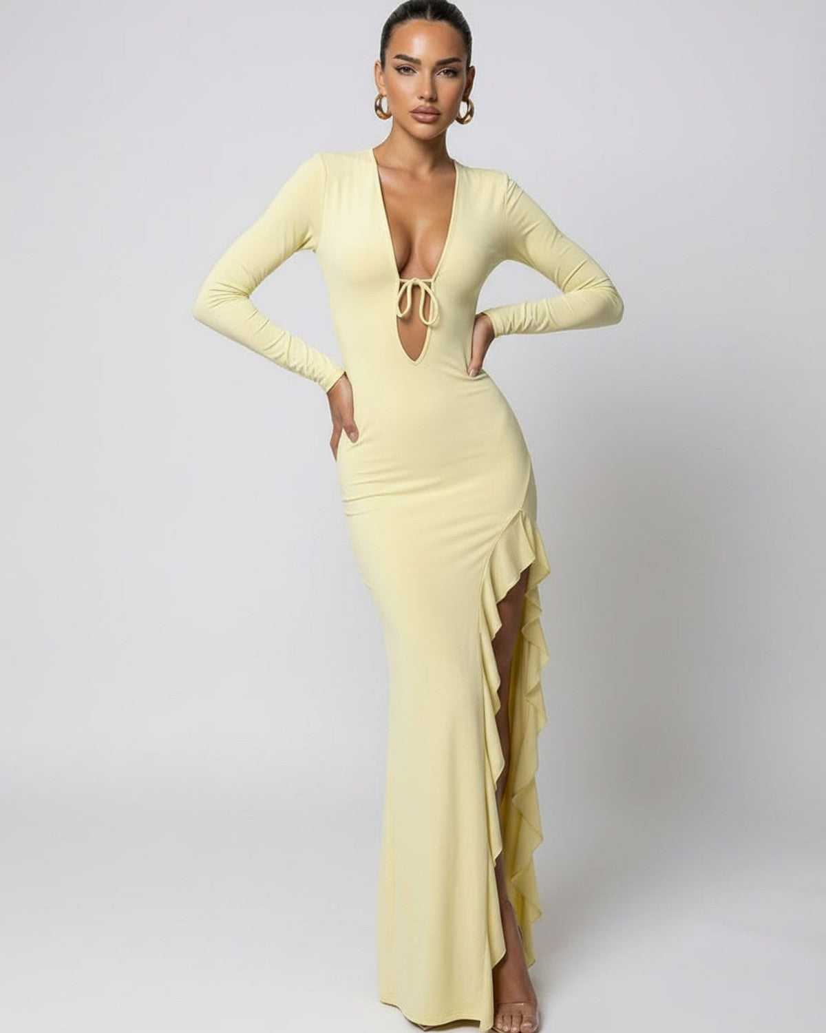 Soleil Maxi Dress by Lauven, yellow deep V-neck design with ruffle high slit, smooth stretch fabric for a sleek silhouette.