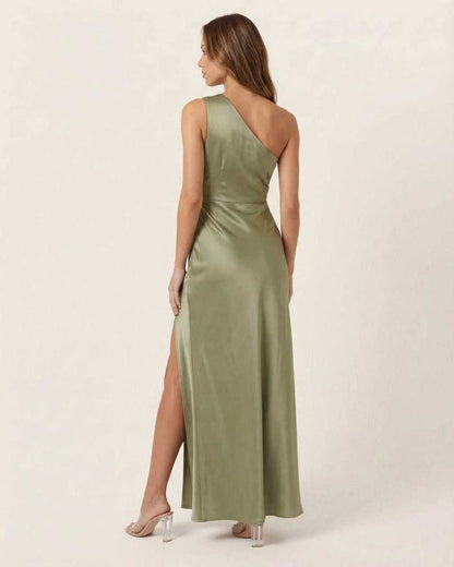 Solene Maxi Dress showcasing a sage green satin fabric, one-shoulder neckline, and elegant side slit from Lauven.