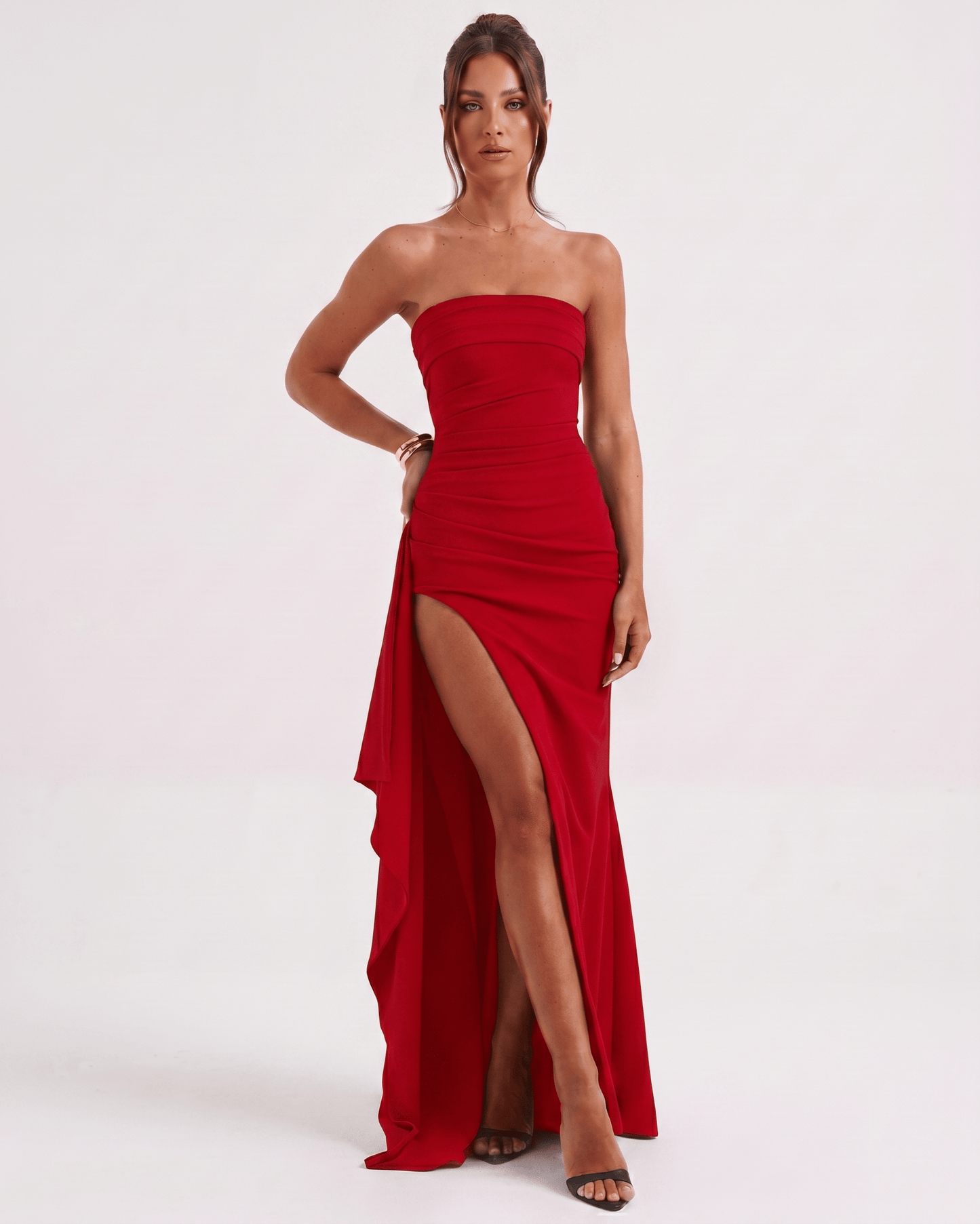 Solenne Maxi Dress by Lauven, red bandeau dress with dramatic side slit and flowing design.