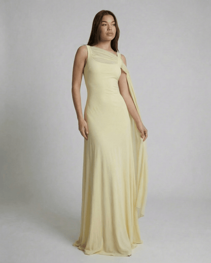 Solenne Maxi Dress by Lauven featuring a light yellow color, square neckline, and mesh shawl detail.