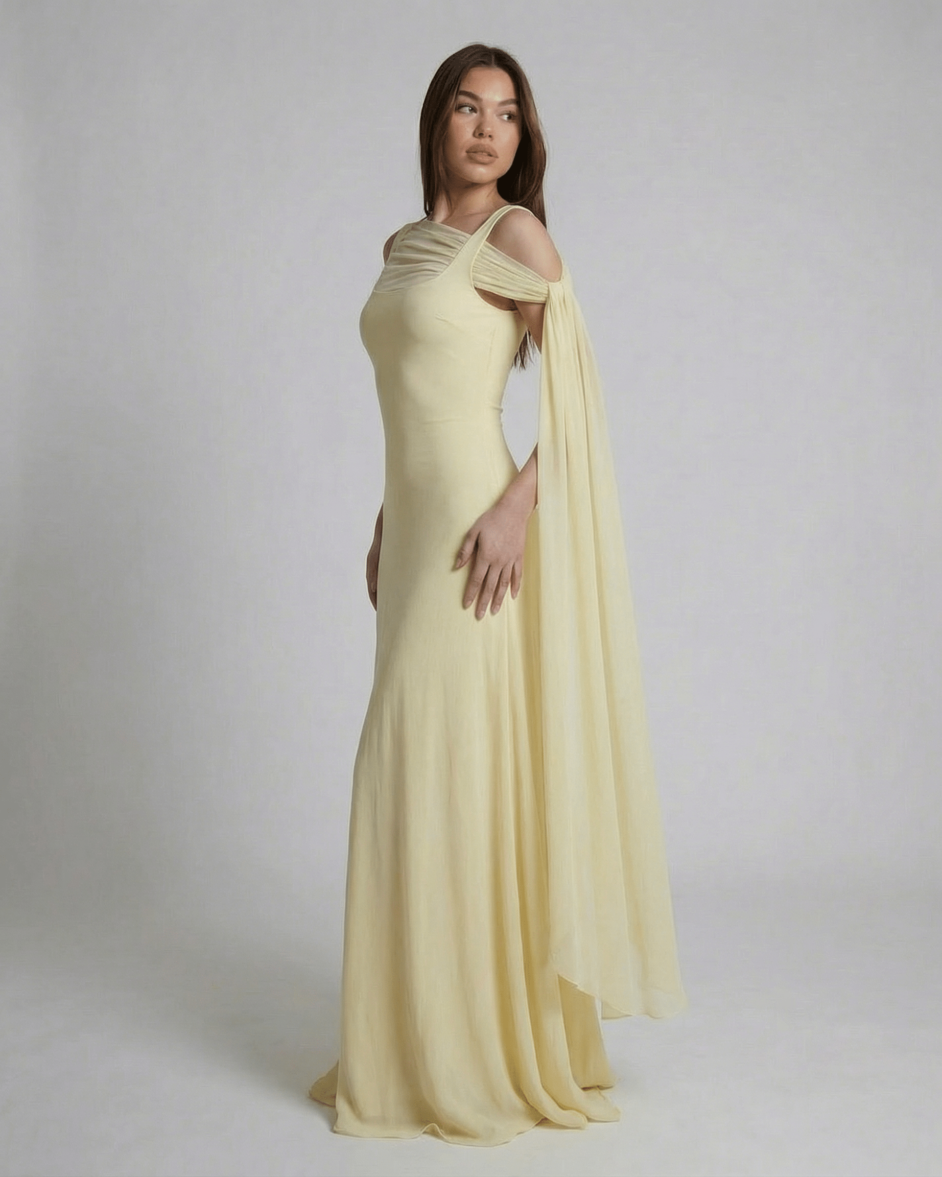 Solenne Maxi Dress by Lauven - light yellow slip maxi dress with square neck and mesh shawl detail.