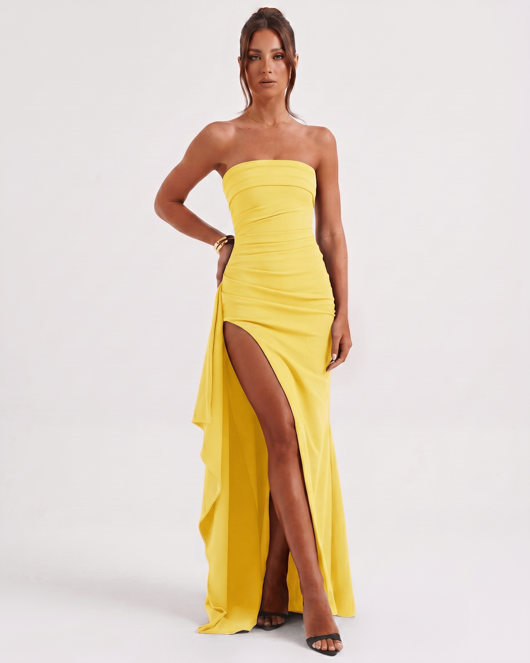 Solenne Maxi Dress by Lauven in yellow, featuring a bandeau design, side slit, and asymmetric panel for a modern look.